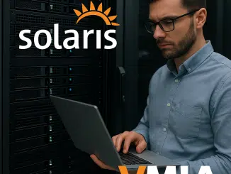 A Man Holding A Laptop